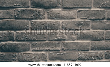 Blank bricks wall of different colour tone. 