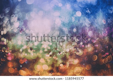 glittering shine bulbs lights background:blur of Christmas wallpaper decorations concept.holiday festival backdrop:sparkle circle lit celebrations display.