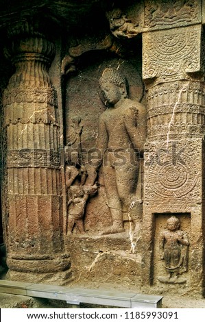 Buddha in a blessing posture carved out of the mountains at Ajanta, Aurangabad 