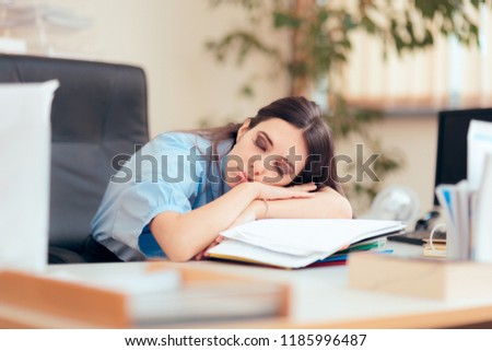 Tired Woman Working Extra Hours at The Office. Sleepy employee with head on the desk trying 
