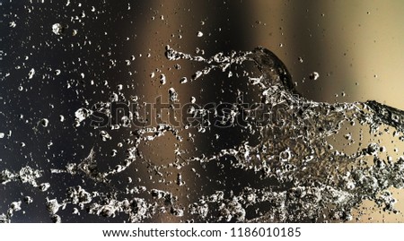 Water splashing in inversion as an abstract background