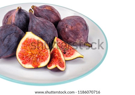 Plate with ripe, sweet figs. Studio Photo