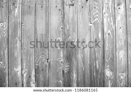Black-and-white photo in retro style with old wooden boards