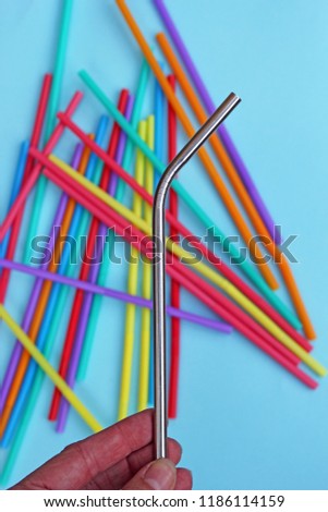 straw straws metal reusable plastic disposable ban drinking background colourful  full screen hand stock, photo, photograph, image, picture, 