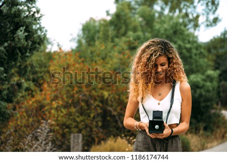 Photographer using vintage camera