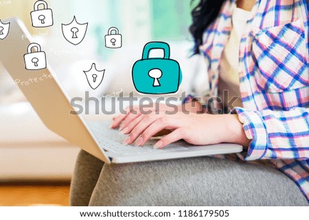 Cyber Security with young woman using a laptop computer