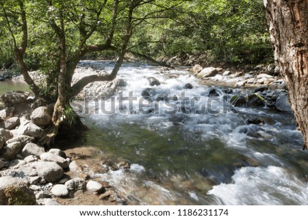 Journeys. Beautiful winding river in the mountains. Mountain river