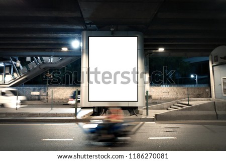 Blank Poster display advertisement on street.Empty poster under Overpass and Night light traffic.