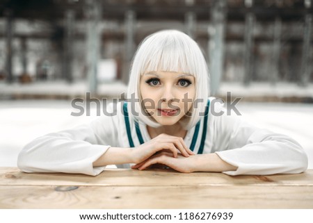 Anime style blonde lady with cold face
