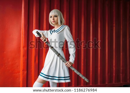 Anime style girl with sword against red container