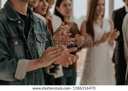 Business team. Group Business Corporate People Meeting and Happiness Clapping Congratulation- Organization, Recruitment, Corporate Meeting, Conferences, Event ,Training . Business Team Worker Office.  Royalty-Free Stock Photo #1186316470