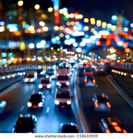 Evening traffic. The city lights. Motion blur. Abstract background. Royalty-Free Stock Photo #118633909