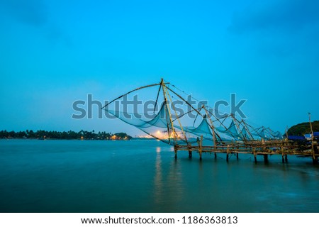 beautiful twilight scene of  Kochi chinese fishnets in Kochi, Kerala. Fort Kochin, south India Royalty-Free Stock Photo #1186363813