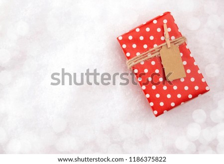 Background of Elegantly Wrapped Gifts on a Bed of Snow