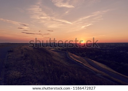 hdr picture of a sunset on a mountain