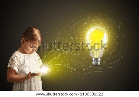 Adorable girl working on tablet with new idea concept