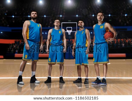 four basketball players standing on basketball court