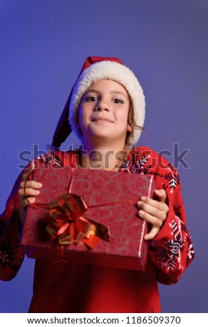 little girl open red gift box