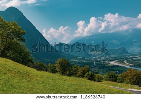 View of the landscape in the Alpine Principality of Liechtenstein across the border into Switzerland