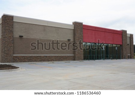 New construction store front with blank signage 