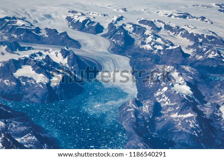 Aerial view of scenic Greenland Glaciers and icebergs Royalty-Free Stock Photo #1186540291