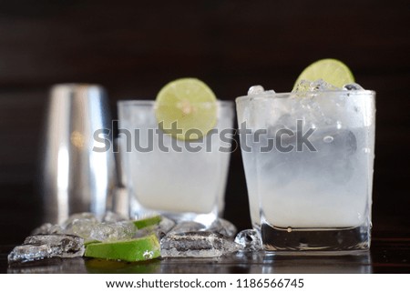 Fresh lime juice on wooden background