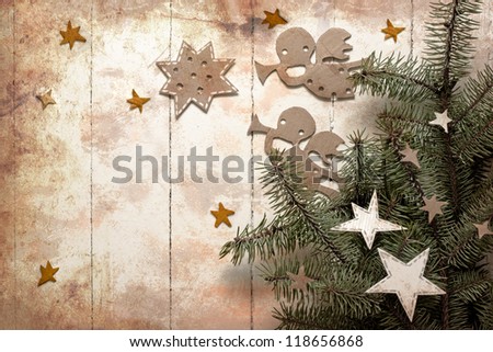 Christmas decorations.Christmas angels with the stars and christmas tree/Vintage christmas background/christmas card with paper decorations