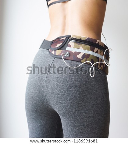 Slim body of young woman asian with running belt.
