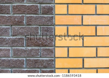 Wall from red and brown bricks. Background