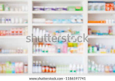 Pharmacy drugstore blur abstract background with medicine and healthcare product on shelves Royalty-Free Stock Photo #1186597741