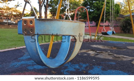Baby swing close-up in a playground