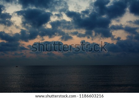 cloudy sky before sunrise at the sea