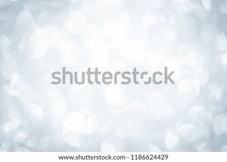 Abstract blue Bokeh circle for Christmas background. Bright glitter and sparkle.