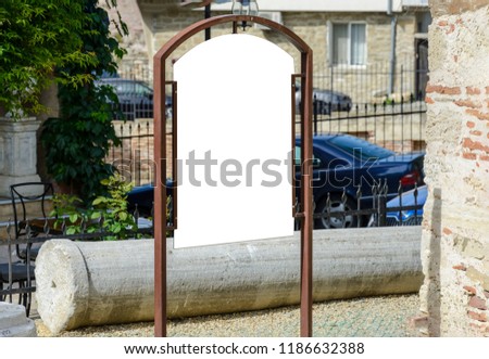Blank sign with place for text, for you advertising. column and church theme.