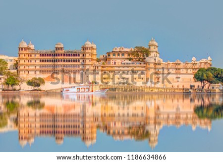 Udaipur City Palace from Lake Pichola. Udaipur, Rajasthan, India Royalty-Free Stock Photo #1186634866