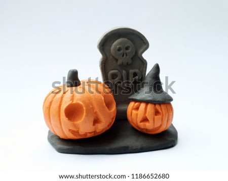 Clay doll halloween pumpkins.