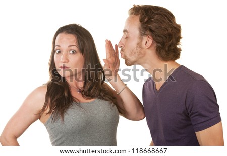 Unhappy woman blocking bearded man's kiss over white background Royalty-Free Stock Photo #118668667
