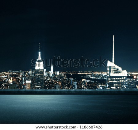 Creative illuminated night New York city background. Urban concept 