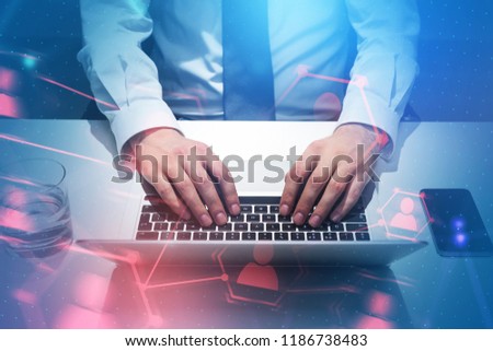 Hands of businessman on laptop keyboard in office. Red people network hologram foreground. Hr concept. Toned image double exposure copy space