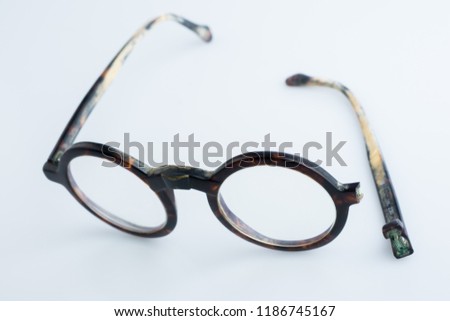 broken glasses on white background