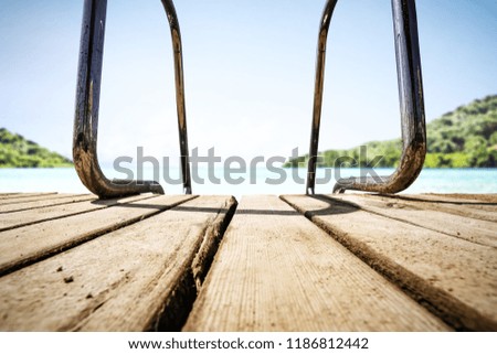 Wooden pier of free space and summer sea landscape. 