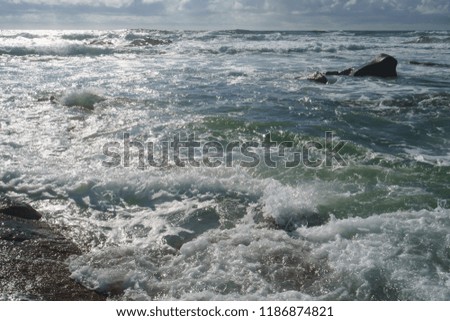 Ocean daytime landscape, giving strength. The space is filled with water, spray and ocean noise