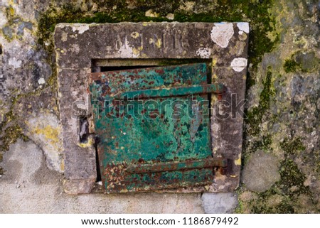 Old rusty door. Green door.