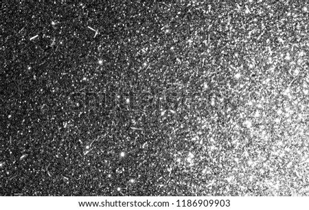 black and white glitter texture abstract background. bokeh. defocused