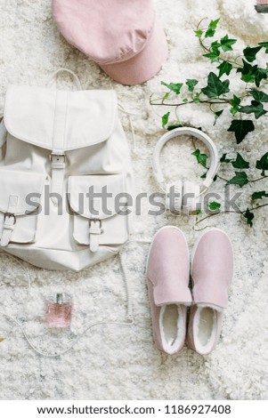 Female autumn clothes on white background. Beauty blog concept. Flat lay