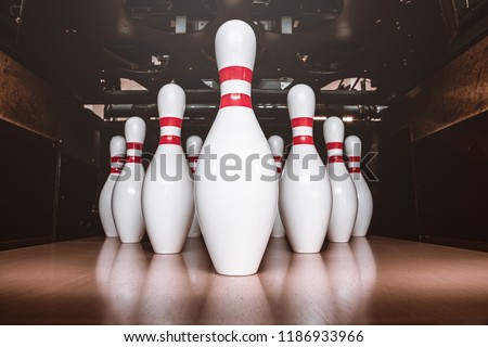 bowling pins, balls and shoes