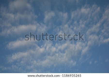 The types of clouds are different here in these we see the feathery fluffy because they fly high in the sky and the wind couldn't reach them to nourish moisture and lower down the background of the he
