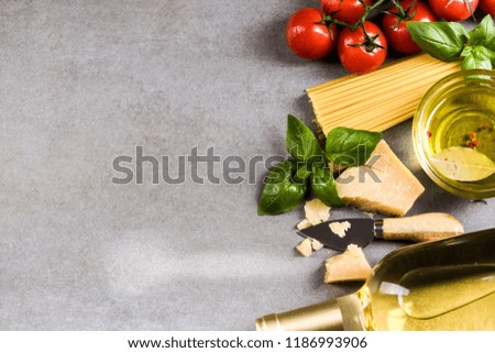 Spaghetti pasta ingredients, border background.