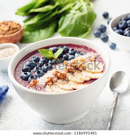 Acai Blueberry Superfood Smoothie Bowl. Closeup view, square crop
