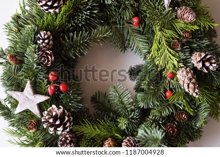 A christmas wreath on a white background.
